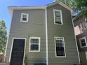 Side view of home with a secure back door and windows at 821 Beckwith Sw St, Atlanta, GA 30314