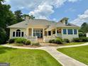 Elegant exterior with manicured landscaping and inviting walkway at 2643 Edgewater Ct, Jonesboro, GA 30236