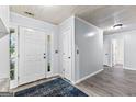 Spacious foyer with tiled floors and natural light at 11765 Fairway Overlook, Fayetteville, GA 30215