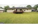 Spacious backyard with a wooden deck, perfect for outdoor entertaining and relaxation at 64 Gregory Ct, Dallas, GA 30157