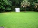 Backyard with a shed at 225 Long Creek Dr, Covington, GA 30016