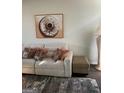 Comfortable living room with neutral-toned furniture, decorative rug, and stylish lamp at 3955 Sweetwater Pkwy, Ellenwood, GA 30294