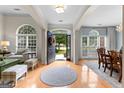 Welcoming foyer with hardwood floors, arched doorways, and bright natural light at 1602 Cascade Overlook, Peachtree City, GA 30269