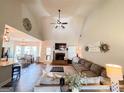 Bright and airy living room featuring a fireplace and open concept layout, perfect for modern living and entertaining at 125 Kayla Ct, Locust Grove, GA 30248