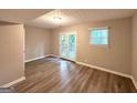 Bedroom with hardwood floors and access to backyard at 2784 Rockdale Dr, Decatur, GA 30034