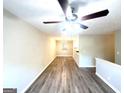 Spacious living room featuring hardwood floors and a ceiling fan at 2784 Rockdale Dr, Decatur, GA 30034