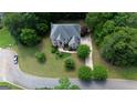 Lovely traditional home in a well-kept community with lush landscaping at 115 Robinwood Ct, Fayetteville, GA 30214