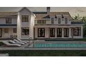 Rear exterior view of a modern farmhouse with a swimming pool at 120 Godby Dr, Fayetteville, GA 30215