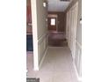 Hallway featuring tile floors and detailed molding at 905 Ohara Dr, Jonesboro, GA 30236