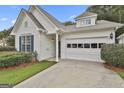 A charming single-story home with a garage and well-maintained landscaping at 2118 Cherry Tree Ln, Peachtree City, GA 30269
