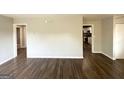 Open-concept living area with modern flooring and neutral wall color at 2103 Keheley Dr, Decatur, GA 30032