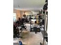 Spacious home gym featuring weightlifting equipment and workout machines for fitness enthusiasts at 120 Alfred Dr, Carrollton, GA 30116
