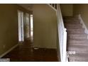 Entryway featuring stairs and an open hallway to the rest of the house at 2225 Blue Ridge Ln, Conyers, GA 30012