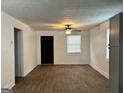 Open living space showcasing modern flooring and a stylish ceiling fan at 1764 Cahoon Sw St, Atlanta, GA 30310