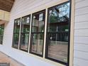 Close up of newly installed builder series windows, offering energy efficiency and natural light at 365 Spruill Bridge Road # 7 - Helmsley Park, Temple, GA 30179