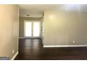A spacious living room with hardwood floors and natural light at 341 Pineland Sw Rd, Mableton, GA 30126