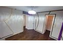 Interesting bedroom features hardwood floors and unique wall design with easy access to large closet and additional spaces at 2378 Charleston Se Pt, Atlanta, GA 30316