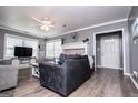 Comfortable living area with fireplace, large windows, and stylish furniture creating a relaxing atmosphere at 6391 Katherine St, Douglasville, GA 30134