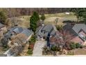 Aerial view of home, showcasing proximity to a golf course and mature trees at 269 Legends Trce, Mcdonough, GA 30253