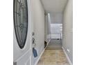 Welcoming foyer with tile flooring and a decorative glass front door at 9138 Sunset Dr, Jonesboro, GA 30238