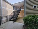 A view of the outdoor staircase to the condo complex entrance at 1392 Orchard Park Dr, Stone Mountain, GA 30083