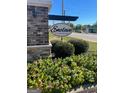 Enclave at Powder Springs community sign surrounded by vibrant landscaping, welcoming residents and visitors alike at 3810 Equity, Powder Springs, GA 30127