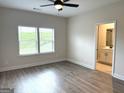 Spacious bedroom with lots of natural light and beautiful laminate flooring at 422 Cantrell Drive, Dallas, GA 30157