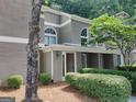 Exterior of the building with trees, plants, manicured bushes, and walkways at 17 Brittany Ne Way, Atlanta, GA 30324