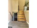 View of staircase leading to upper and lower floors at 6485 Boca Grande Blvd, Forest Park, GA 30297