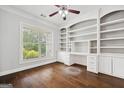 Spacious office with built-in shelving and a large window at 1220 Roswell Manor Cir, Roswell, GA 30076
