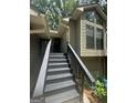 Inviting front entrance with a set of stairs leading to the front door at 2532 N Carroll Ct, Villa Rica, GA 30180