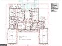 Detailed floor plan showcasing the layout of the home's first floor including a circular staircase and garage space at 4309 Giverny Blvd, Fairburn, GA 30213