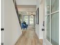 Inviting entryway with hardwood floors leads to a comfortable living space at 4484 Eastbrook Pl # 54B, Snellville, GA 30039