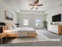 Tranquil, virtually staged primary bedroom featuring a tray ceiling, plush carpet, and ample natural light at 36 Crescent Chase, Dallas, GA 30157