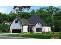 Beautiful white brick home with a cozy entrance and well-maintained lawn in a serene, tree-filled setting at 1077 Crooked Creek Rd, Lithonia, GA 30058
