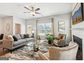 Bright and airy living room showcasing stylish decor, comfortable seating, and a modern fireplace at 179 Stanchion Dr, Union City, GA 30291