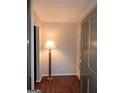 Inviting entryway featuring hardwood floors and a stylish lamp, creating a warm welcome at 37 La Rue Nw Pl, Atlanta, GA 30327