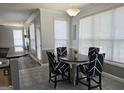 Cozy dining area features great natural light and access to more living space at 176 Fairoaks Cir, Stockbridge, GA 30281