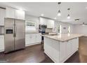 Bright, open kitchen with granite countertops, stainless steel appliances and a large center island at 644 Albert Nw St, Atlanta, GA 30318