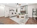 Modern living room with a stylish fireplace, plush seating, and contemporary decor at 1675 White Oak Way, Decatur, GA 30032