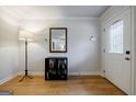 Bright foyer featuring sleek flooring, a stylish mirror, and a convenient console table at 2985 Westbury Dr, Decatur, GA 30033