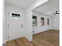 Bright living room showcasing wood floors, white walls, and windows providing natural light at 1400 North Avenue Nw, Atlanta, GA 30318