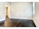 Bedroom featuring hardwood floors, neutral walls, and natural light from the window at 1914 North Nw Ave, Atlanta, GA 30318