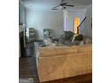 Cozy living room area with fireplace, modern furniture, and access to other areas of the home at 2208 Ginger Lake Ne Dr, Conyers, GA 30013