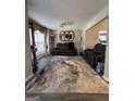 Spacious living room with neutral tones, plush seating and stylish decor at 25 Castlehill Ct, Covington, GA 30016