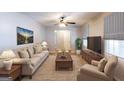 Inviting living room with soft, neutral tones, comfortable seating, and a serene atmosphere at 1105 Buckhurst Dr, Atlanta, GA 30349