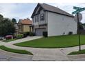 Suburban house with well-kept lawn, two-car garage, and easy access to community streets at 2424 Saint Andrews Rdg, College Park, GA 30337