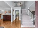 Inviting foyer with hardwood floors and staircase leading to the second floor at 2864 Wyndcliff Ct, Marietta, GA 30066