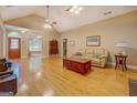 Spacious living room with hardwood floors, vaulted ceilings, and natural light at 1041 Flat Rock Rd, Covington, GA 30014