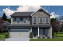 Two story home with grey brick, siding, and a two car garage on a sunny day at 504 Clayborne Way # 248A, Loganville, GA 30052